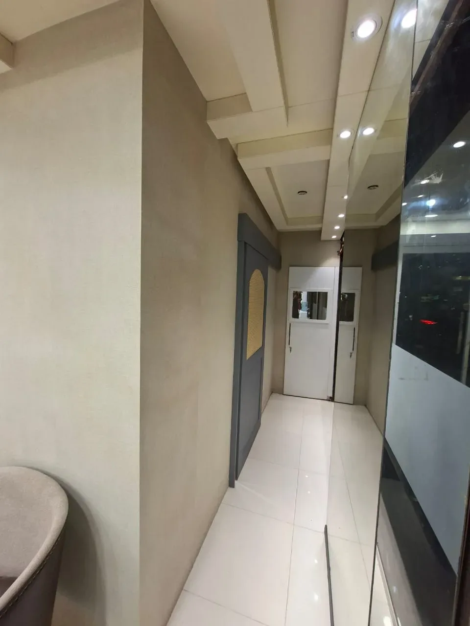 Corridor leading to the treatment rooms at the Clifton Block 9 dental clinic, Karachi